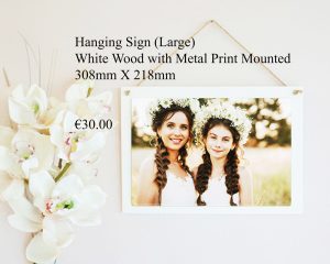 Large hanging sign made of white wood with a mounted metal print, measuring 308mm x 218mm.