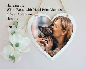 Hanging sign made of white wood with a mounted metal print, measuring 215mm x 218mm.