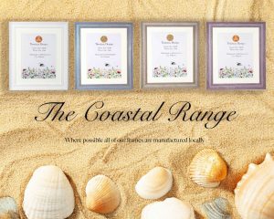 Coastal Range photo frame, locally manufactured from solid wood in seaside-inspired colours—white, blue/grey, sand, or lilac—suitable for standing or hanging in portrait or landscape orientation.