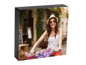 Close-up of a photo block featuring an image of a woman riding a bike.