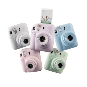 Instax Mini 12™ instant camera in a bubbly design, available in five pastel colors, featuring a selfie mirror, close-up mode with adjustable viewfinder, automatic flash, and credit card-sized prints.